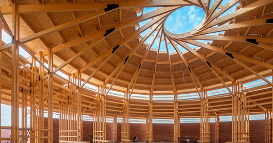 LUO studio tops exhibition hall in china with spiral wooden roof frame
